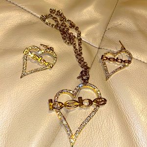 Bebe necklace and earrings gold w/white rhinestones.